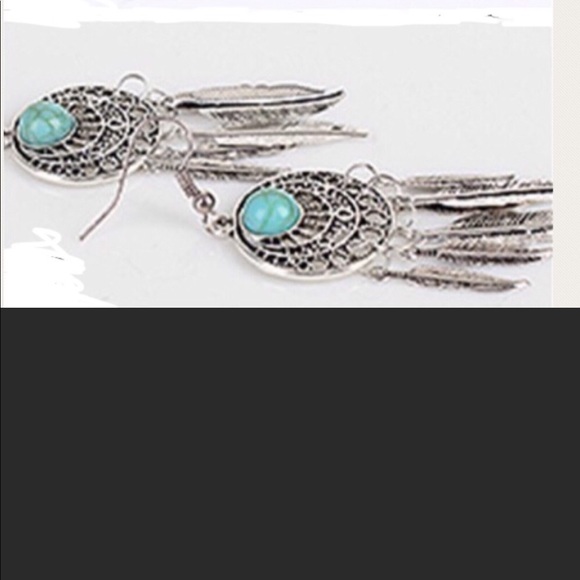 3/$20 Silver tone feather earrings - Picture 2 of 2